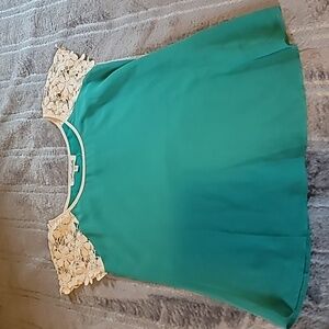 Women's blouse. Green with lace. NWT